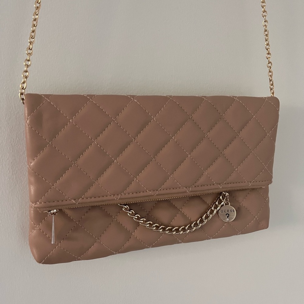 Guess purse in blush with gold chain.